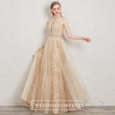 The Penelopia Champagne Halter Gown
