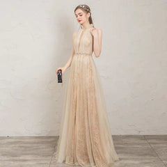 The Penelopia Champagne Halter Gown