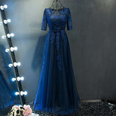 The Meredy Long Sleeve Midnight Blue Gown