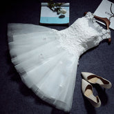 The Teselly White Sleeveless Short Tulle Dress