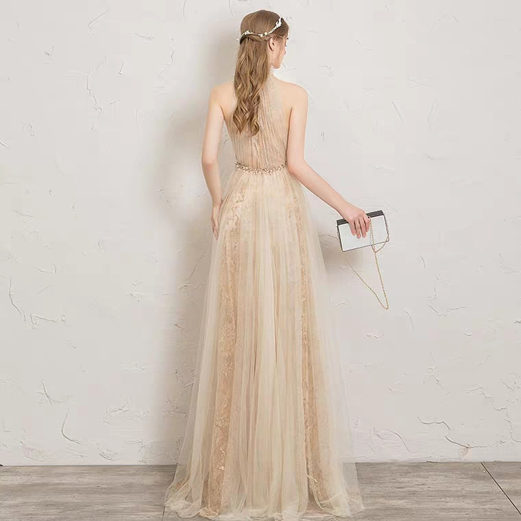 The Penelopia Champagne Halter Gown