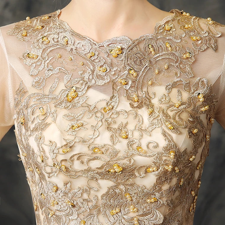 The Stellar Champagne Ball Gown