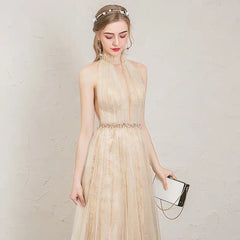 The Penelopia Champagne Halter Gown