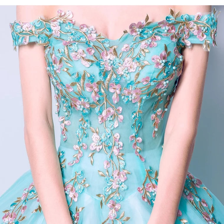 The Rynbitha Off Shoulder Tiffany Green Gown