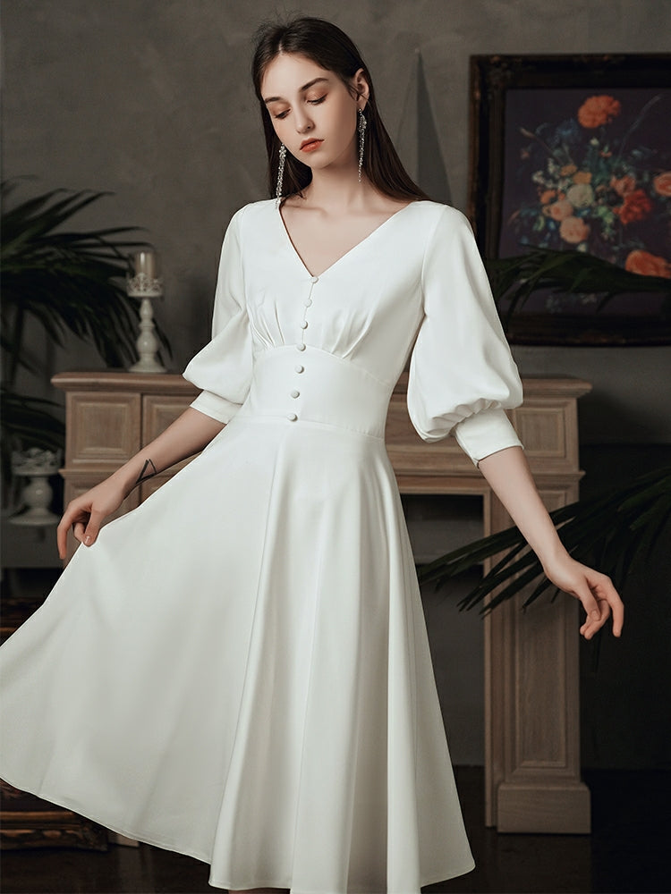 The Kelista Puff Sleeves Midi Gown