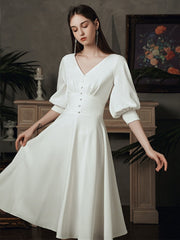 The Kelista Puff Sleeves Midi Gown