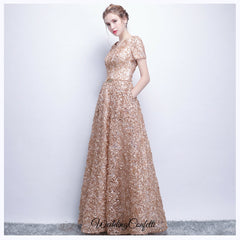 The Rikka Gold Short Sleeve Gown