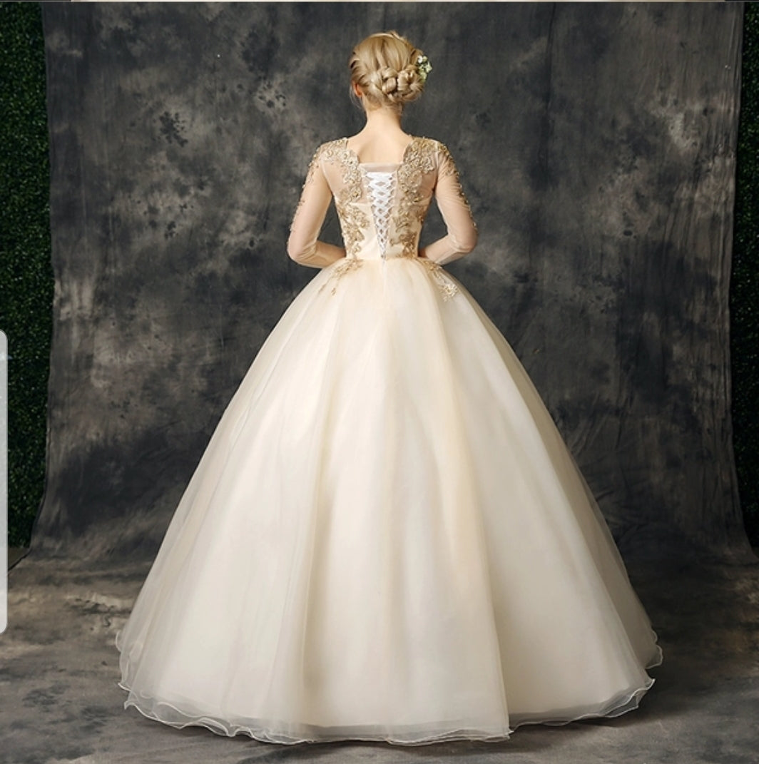 The Stellar Champagne Ball Gown
