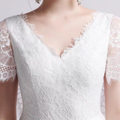 The Petunia Wedding Bridal Illusion Short Draped Sleeves Lace Gown